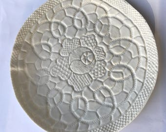 Lacy white textured porcelain (ceramic) dish