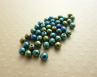 Lot de 50 perles rondes 4 mm Iris Green - R4-0091