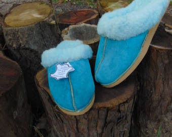 Mules en peau de mouton bleu pour femme
