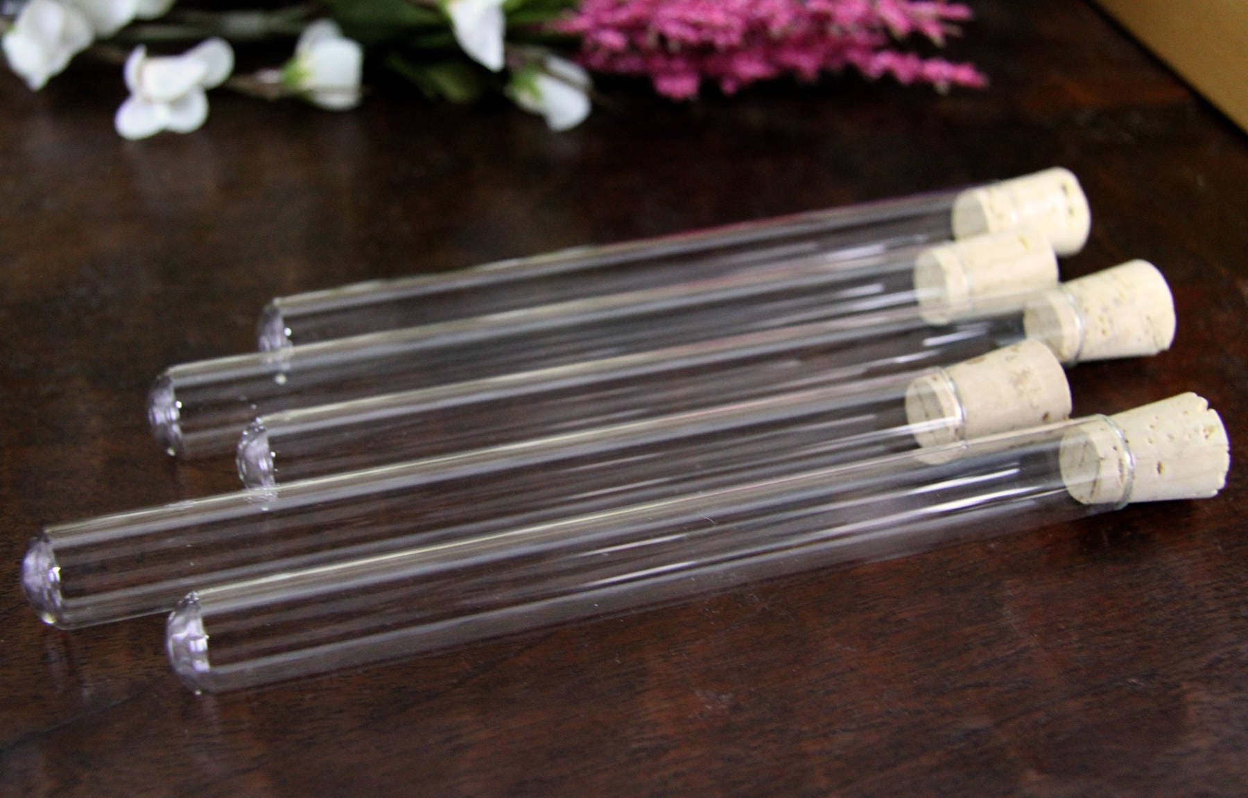 50 glass test tubes with corks