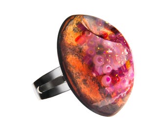 Resin ring on mysterious background
