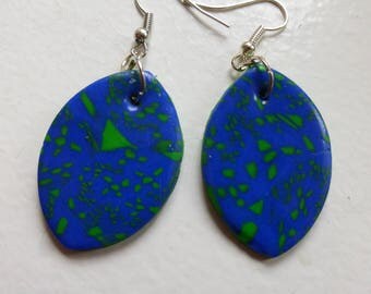 Earrings light forms patterns of blue, green leaves