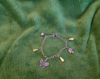 Yellow garden and drops charms bracelet