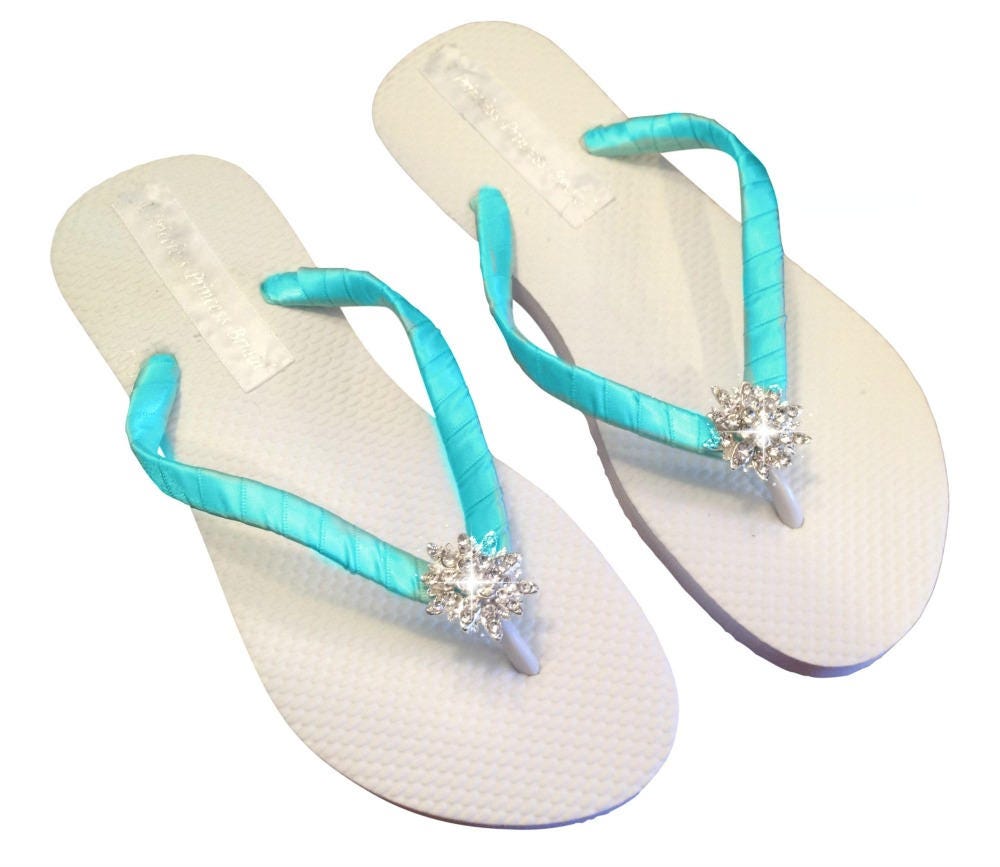 aqua colored flip flops