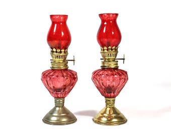 Two Miniature Antique Pink Glass Hurricane Oil Lamps