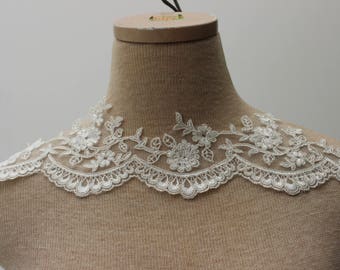 Alencon Ivory Beaded Lace trim with Faux Pearls. 4 inches wide.