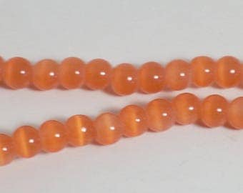 Cat's eye orange glass 4mm 20 beads