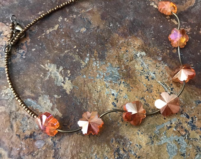 Orange flower necklace, orange necklace, goldstone necklace, brass necklace, beaded necklace, brown necklace, orange crystal necklace