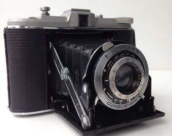 Agfa Isolette comur rapid old folding camera with brown leather case