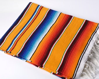 Mexican blanket or serape in yellow