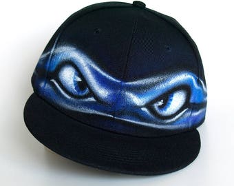 Ninja TURTLE Snapback hat, Blue ninja Turtle MASK, angry eyes, flat peak cap, child and adult size snap back, PERSONALIZED with custom name