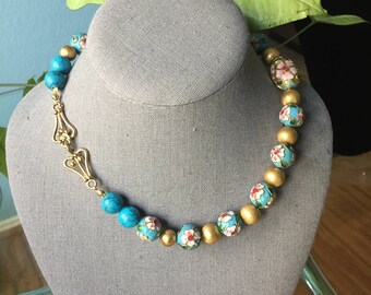 Turquoise colored cloisonne necklace made with brass beads and matching earrings