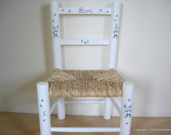 White straw Chair decorated with the name of child