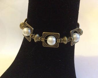 Bronze bracelet with ivory pearls