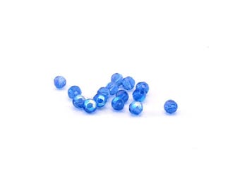 Lot de 50 perles rondes acryliques bleu irisé
