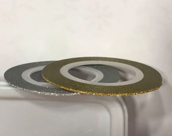 Set, 2 rolls nail art striping tape, 1 mm, glitter gold and glitter silver (S3)+