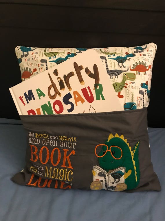 Embroidered Dinosaur Reading Pillow with pocket. 16 x