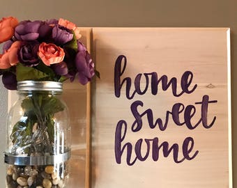 Mason jar "home sweet home" with flowers