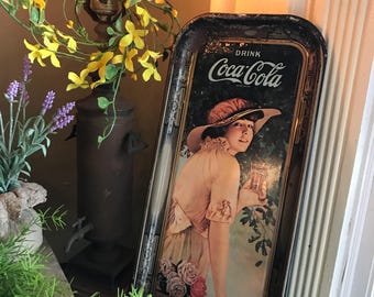 1972 replica tray with 1916 Coca Cola ad.