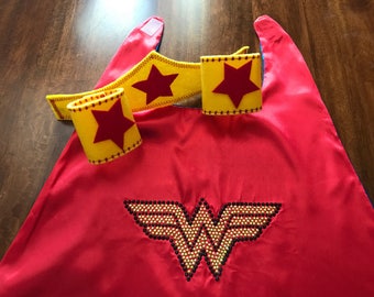 Wonder Woman Cape Set With Rhinestone Emblem, Headband , And Wristbands. The Perfect Outfit For Your Superhero To Save The Universe !!!