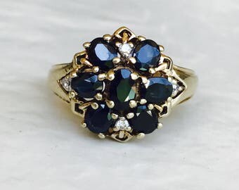 Sapphire and diamond cluster vintage ring in yellow gold
