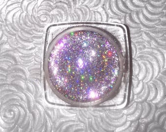 Shade name ( Euphoria ). Lavender holographic loose glitter pigmet. 4 grams in a jar with sifter and seal.