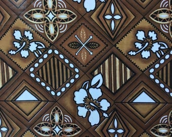 Polynesian fabric Brown and white hibiscus flower pattern
