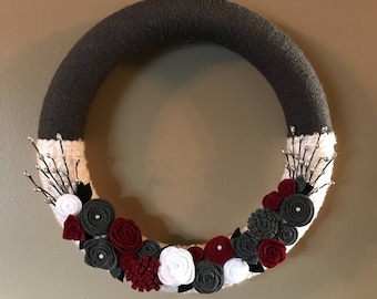 Gray white and red yarn and felt wreath