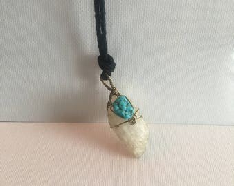 Wire wrapped crystal with turquoise