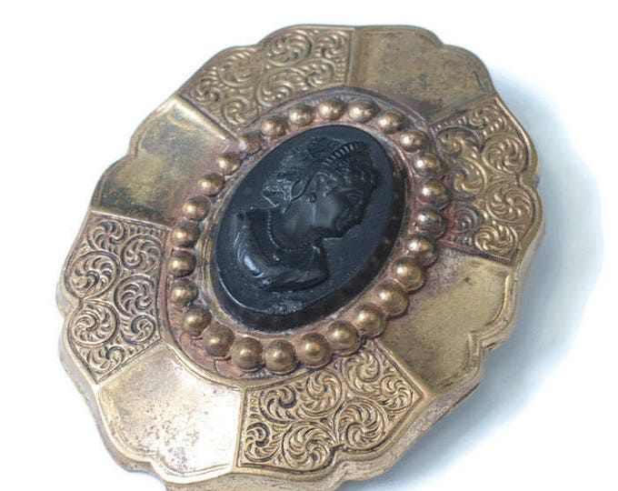 Victorian Era Black Cameo Brooch Chased and Smooth Segmented Setting