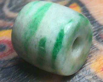 Hand Carved Maw Sit Sit Bead that looks like hard candy