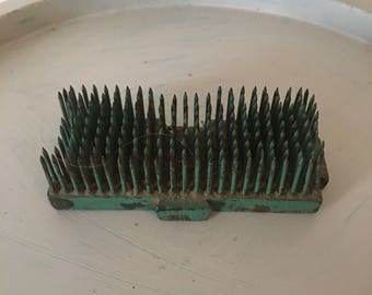 Vintage green metal flower frog