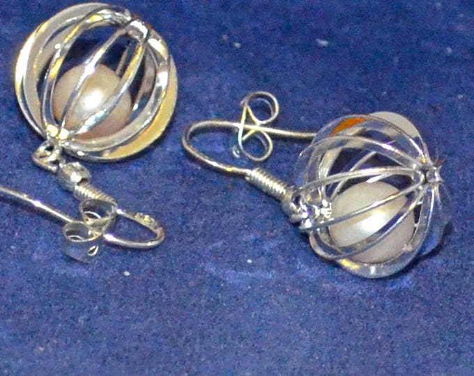 Pearls in a Cage, 7mm Round, not Drilled, Natural, Set in a Silver Plated Cage E1087