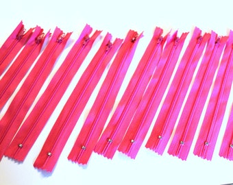 Pink set of 12 zippers 20cm