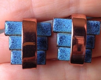 Copper and blue clip on earrings.