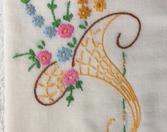 Vintage pillowcase with embroidery baskets