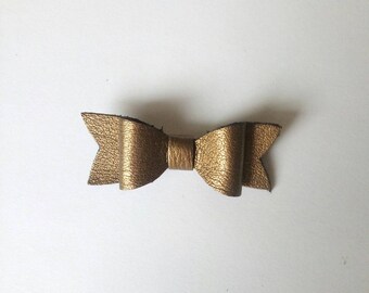 Bronze "Nomad" leather bow brooch