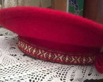 Bright red wool beret