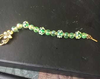 Beaded green and gold bracelet