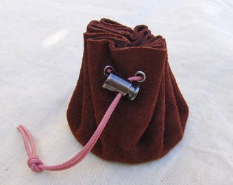 Coin purse is plum suede