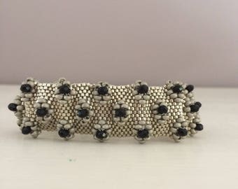 woven i black and silver beaded bracelet