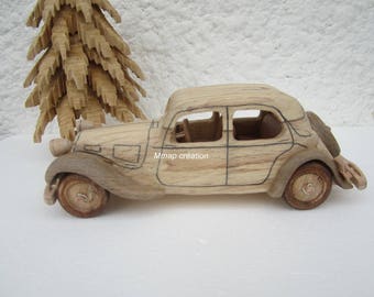 Wooden miniature of a Citroen traction before 11 CV car.