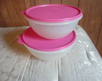 Lot of 2- tupperware wonderlier bowls with seals- clear - rose- 12 cup and 8 3/4 cup. Very, very gently used. Numbers 2518, 2515,2519,&2516