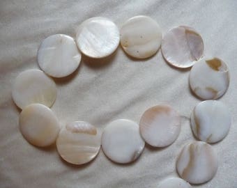 Beads, Mother of Pearl, 30mm Flat Round Coin Natural Bleached. Sold per 15 inch strand and there are 13 beads on the strand.