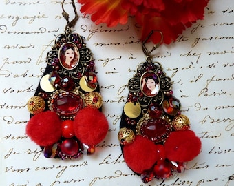 Precious textil earring in red, black and gold, pompons