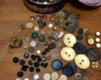 Large lot of vintage, antique, military buttons in an old biscuit tin.