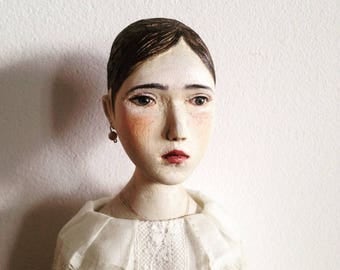 Hand curved wooden art doll