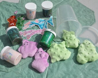 Ultimate Slime Lover's Package includes ONE 5 oz slime, ONE slime plush choose your color, ONE squishy bear keychain, stickers plus extras