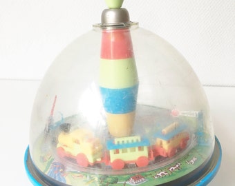 Musical tops, spinning tops, large tops, musical toys, vintage spinning tops, old tops, toy train, children's toys, old toys