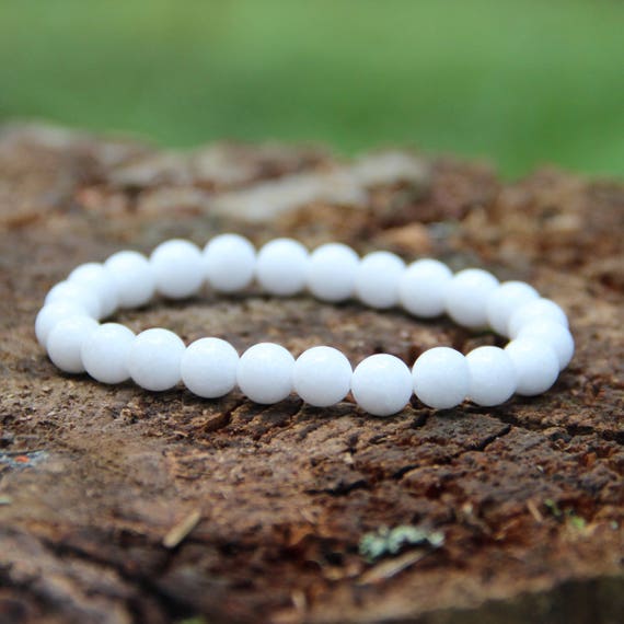 White jade beaded bracelet with 8 mm beads on elastic band